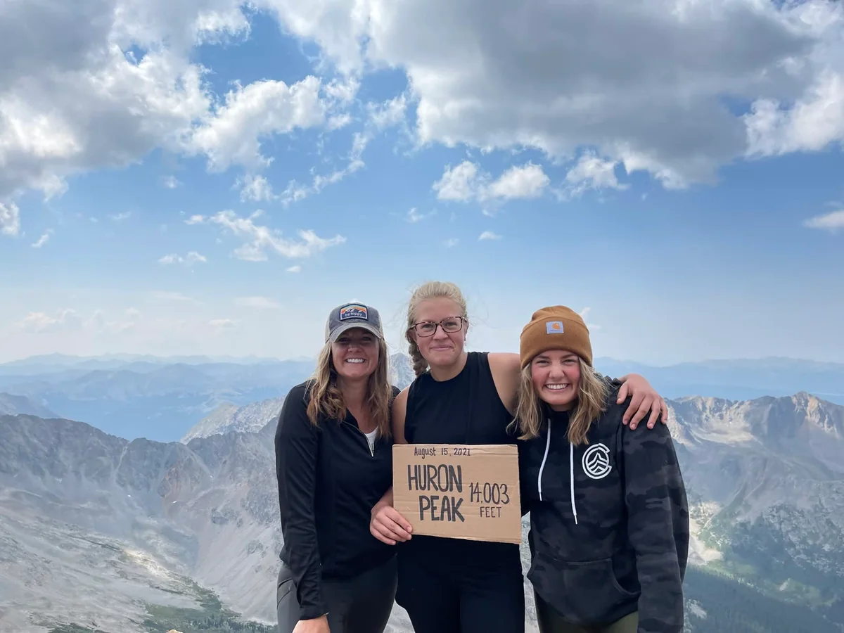 Laura Parker with her two daughters at the summit of Huron Peak, Colorado